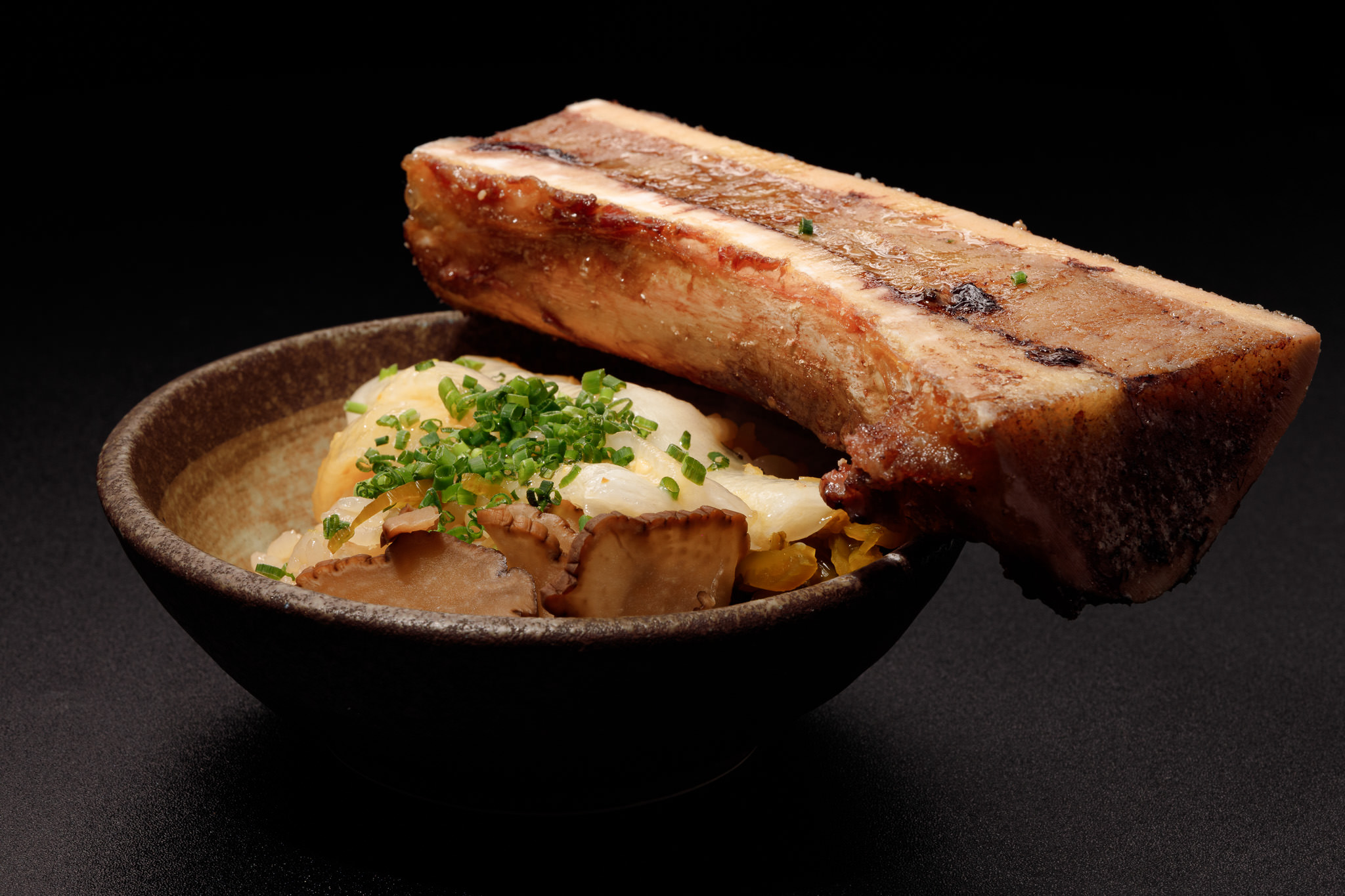 Ronin Omakase Bone marrow sashimi, the promenade docklands, food photography on black background